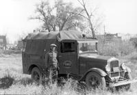 Thumbnail for 'Harness, Frank - 1930 (ca.) - Pictured with his Public Service Truck'