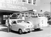 Thumbnail for 'Englewood Volunteer Fire Department - 1954 - Herb Palmer pictured with Trucks'
