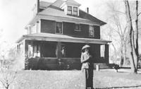 Thumbnail for 'Jones Home - 1908 - Woman standing in front of the house'