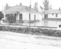 Thumbnail for 'Street View, Broadway, 3400 S - 1927 - Flooding of houses with flood water up to windows'