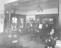 Thumbnail for 'House, Broadway, 3305 S - 1910 (ca.) - Jacob Jones Home, interior room with a grand piano'