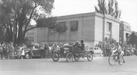 Thumbnail for 'Parade, Englewood's Golden Jubilee - 1953 - Old time car passing Englewood High School'