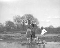 Thumbnail for 'South Platte River - 1925 (ca.) - Three people standing in the river'