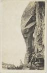 Thumbnail for 'Man standing next to a rock formation near Mesa Verde.'