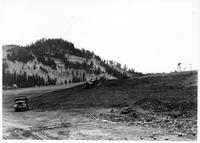 Thumbnail for 'View of bulldozer trimming slope'