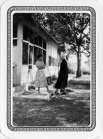 Thumbnail for 'Two Women Standing Next to a House (Durango, Colo.)'