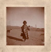 Thumbnail for 'Indian Individual with a Blanket and Container on Their Back'
