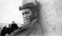 Thumbnail for 'Portrait of an Indian Man Leaning Against an Adobe Wall'