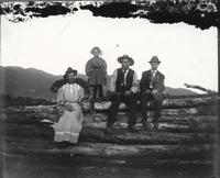 Thumbnail for 'Family Sitting on Wooden Fence'