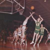 Thumbnail for 'Western State and Adams State players go for a rebound in Mountaineer Gymnasium, 1963.'
