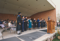 Thumbnail for 'Mid-1990s Summer Commencement exercises in Quigley bandshell'