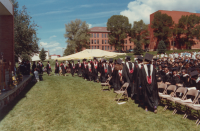 Thumbnail for 'Graduating seniors line up to receive their diplomas, Summer Commencement, early 1990s.'