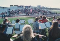 Thumbnail for 'The orchestra performs prelude music at the 1993 Commencement exercises in Mountaineer Bowl.'