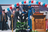 Thumbnail for 'Art professor Lee Johnson is conferred emeritus status at the 2004 Commencement exercises.'