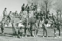 Thumbnail for 'A late-1980s WSC basketball team poses for a photograph in Gunnison's city park southwest of campus.'