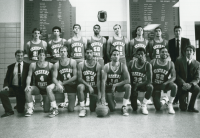 Thumbnail for 'The 1987-88 WSC varsity team poses for a photograph in a Wright Gymnasium hallway.'