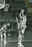 Thumbnail for 'A WSC player attempts an across-the-body shot in a game against Southern Utah, ca. late 1980s.'