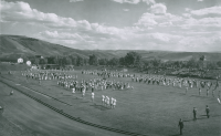 Thumbnail for 'Marching bands, twirlers, and others entertain the crowd at the newly-completed Mountaineer Bowl '