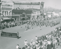 Thumbnail for 'The Montezuma County High School Panther Band marches south on Main Street during WSC's Band Day, ca. mid-1950s.'