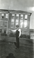 Thumbnail for 'Biology professor and Dean of Students Dr. John C. Johnson, tending Irrigation ditches on the west side of North Hall (Taylor...'