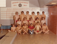 Thumbnail for 'A mid-1970s men's swim team poses for a photograph poolside in Wright Gymnasium.'