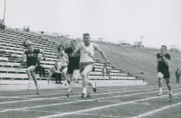 Thumbnail for 'A WSC runner is in the lead at a Mountaineer Bowl track and field meet against the School of Mines, ca. 1959.'