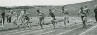 Thumbnail for 'A sprint race begins at a WSC track and field meet in Mountaineer Bowl, ca. late 1950s.'