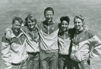 Thumbnail for 'WSC Track coach Duane Vandenbusche poses with four members of his women's team, ca. early 1990s.'