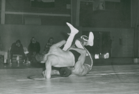 Thumbnail for 'It looks like a takedown for a Mountaineer wrestler in Mountaineer Gymnasium action.  Photo is dated 1959.'