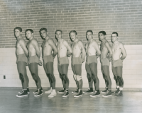 Thumbnail for 'Part of the 1957 Mountaineer wrestling team pose for a photograph in Mountaineer Gymnasium.'