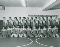 Thumbnail for 'The 1972 Mountaineer wrestlers pose for a team photograph.  Western State hosted the 1972 M.I.W.A. Wrestling Tournament and...'