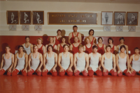 Thumbnail for 'The Mountaineer wrestling team and head coach Marv Allen pose for a photograph in Mountaineer Gymnasium, ca. 1973.'