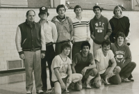 Thumbnail for 'Coach Tracy Borah poses with an early-1980s wrestling  squad in Wright Gymnasium.'