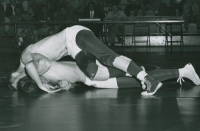 Thumbnail for 'WSC intramurals included wrestling.  This action, complete with a score table and many spectators, is ca. 1960.'
