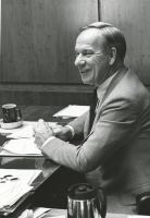 Thumbnail for 'President John Mellon in Taylor conference room, ca. 1975.'