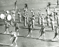 Thumbnail for 'Part of the Mountaineer Marching Band and twirlers perform, ca. 1955.'
