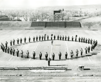 Thumbnail for 'Mountaineer Marching Band in formation, Mountaineer Bowl, ca. 1962.'