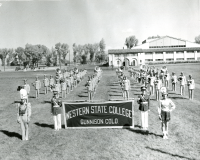 Thumbnail for 'The Mountaineer Marching Band in formation in front of Mountaineer Gym, 1953.'