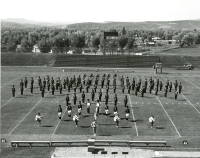Thumbnail for 'Mountaineer Marching Band in formation, Mountaineer Bowl ca. 1972.'