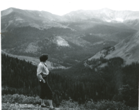 Thumbnail for 'A member of the Hiking and Outing Club on a local overlook, early 1950s.'