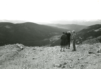 Thumbnail for 'Hiking and Outing Club members photograph the scenery at an overlook, ca. early 1950s.'