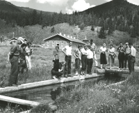 Thumbnail for 'Hiking and Outing Club members watching the big trout at the Pitkin (?) state fish hatchery, ca. early 1950s.'
