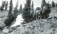 Thumbnail for 'A group of Hiking and Outing Club members at Cochetopa Falls, circa early 1950s.'