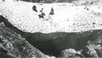 Thumbnail for 'Four Hiking and Outing Club members pose on an (unknown) glacier, summer 1933.'