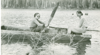 Thumbnail for 'Hiking and Outing Club members enjoy Lake Irwin in a homemade boat, circa 1933.'