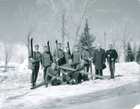 Thumbnail for 'The 1966 ski team poses for a team photograph on the west side of Taylor Hall.'