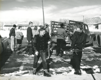 Thumbnail for 'Students load their ski equipment into a pickup truck before leaving for Rozman Hill, late winter 1959.'