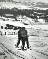 Thumbnail for 'Julia Jackson and a friend ride the rope tow up Cupola Hill, mid 1950s.'