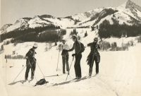 Thumbnail for 'WSC instructor Paul Lenhart cross country skis with some students at the base of Mt. Crested Butte, ca. early 1970s.'