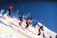 Thumbnail for 'A group of five skiers start down the slopes at Crested Butte, ca. 1990.'